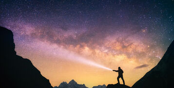 Silhouette,Of,The,Man,Standing,Against,The,Milky,Way,In